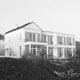 Neubau eines Mehrfamilienauses mit Bürofläche auf Rügen als Passivhaus